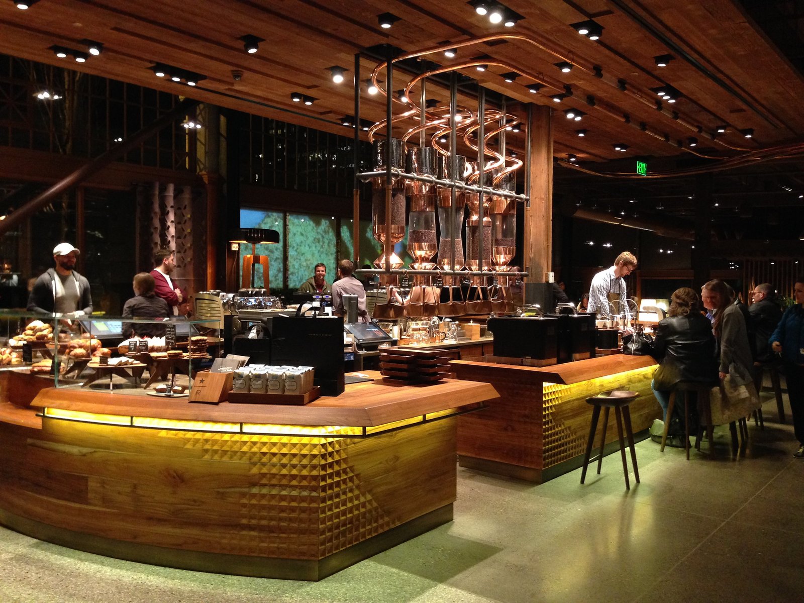 A estrela de chinelas de chinês de infusão de tecnologia da Starbucks em Seattle como parte do abalo mais amplo no Coffee Giant